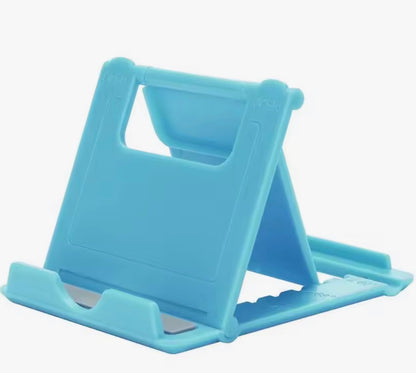 Adjustable trading card stands in all four colors — black, blue, pink, silver
