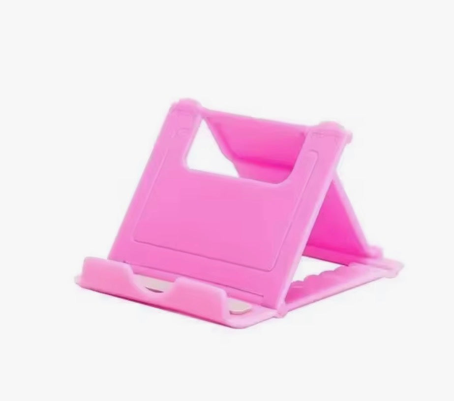 Multiple adjustable trading card stands set up on a card show display table